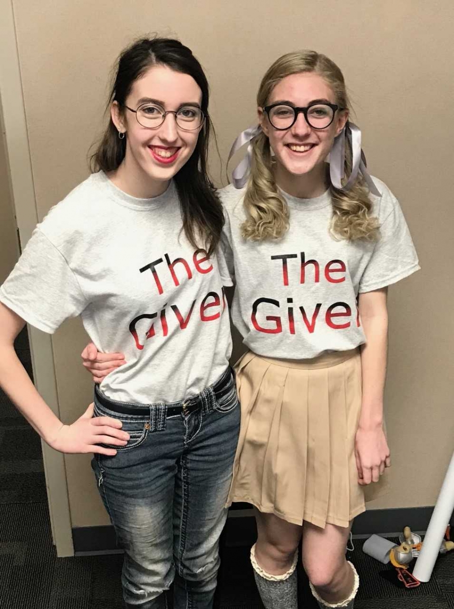 two girls with matching shirts